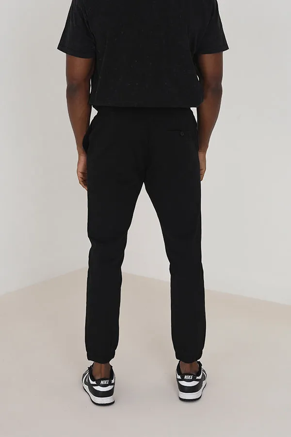 BLACK COTTON TWILL ELASTICATED CUFFED TROUSERS