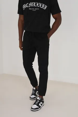 BLACK COTTON TWILL ELASTICATED CUFFED TROUSERS