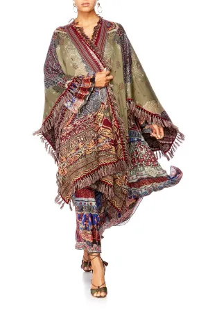 KNITTED PONCHO WITH FRINGING THE CARAVAN
